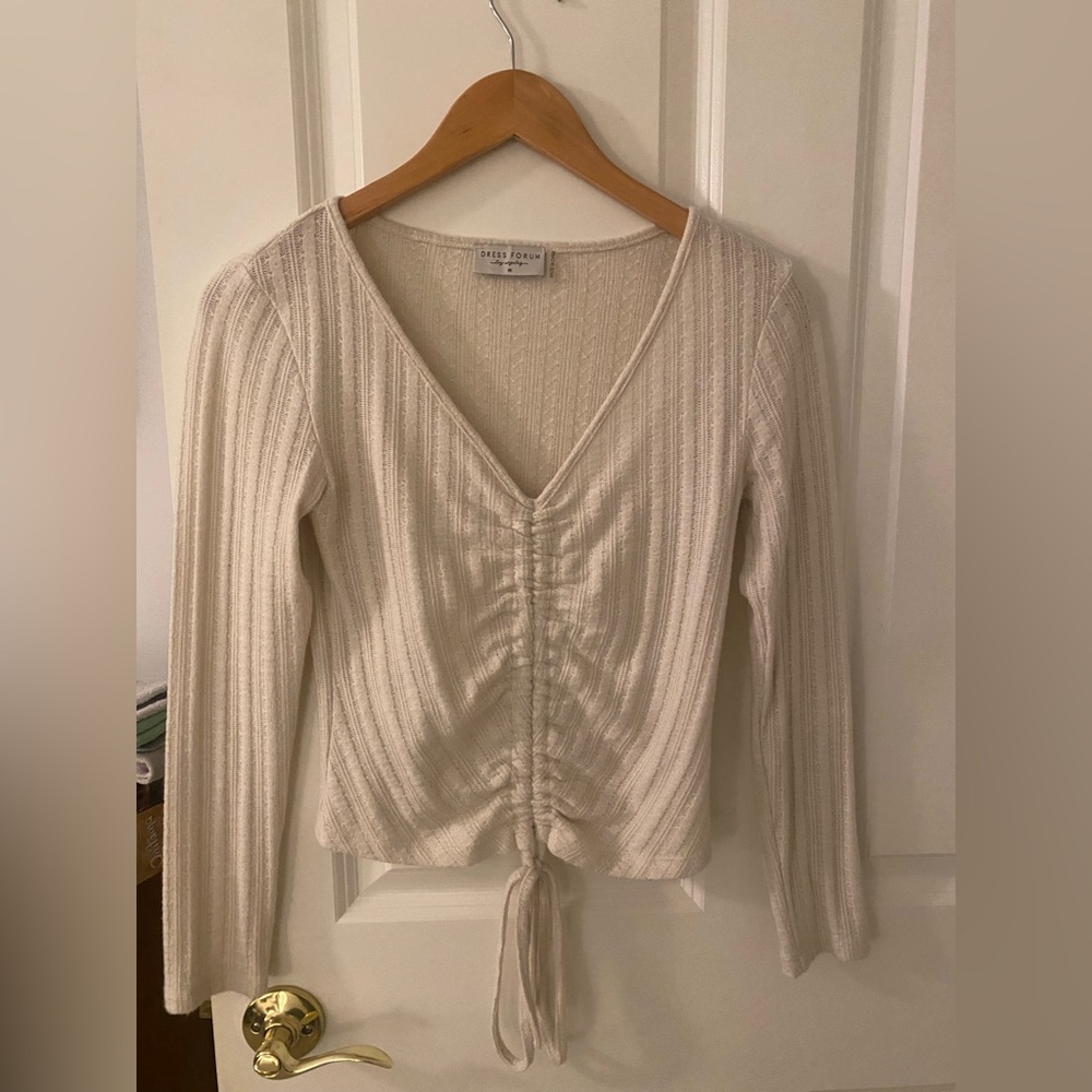 Cute and soft cropped cream colored sweater